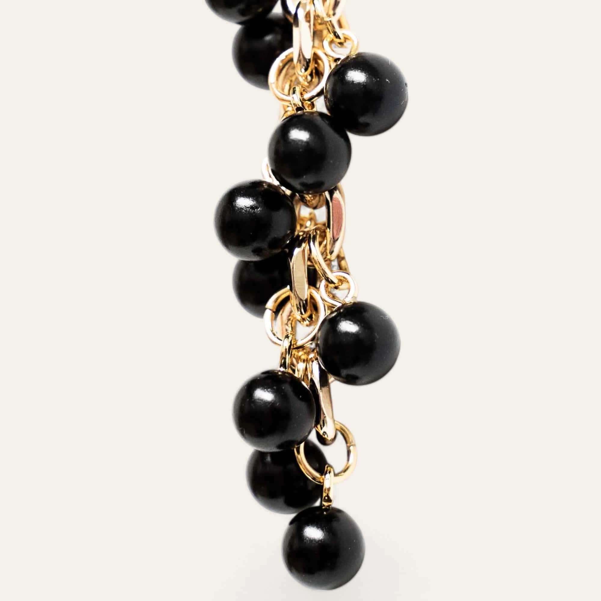 Venus Tassel | Black with Gold hardware